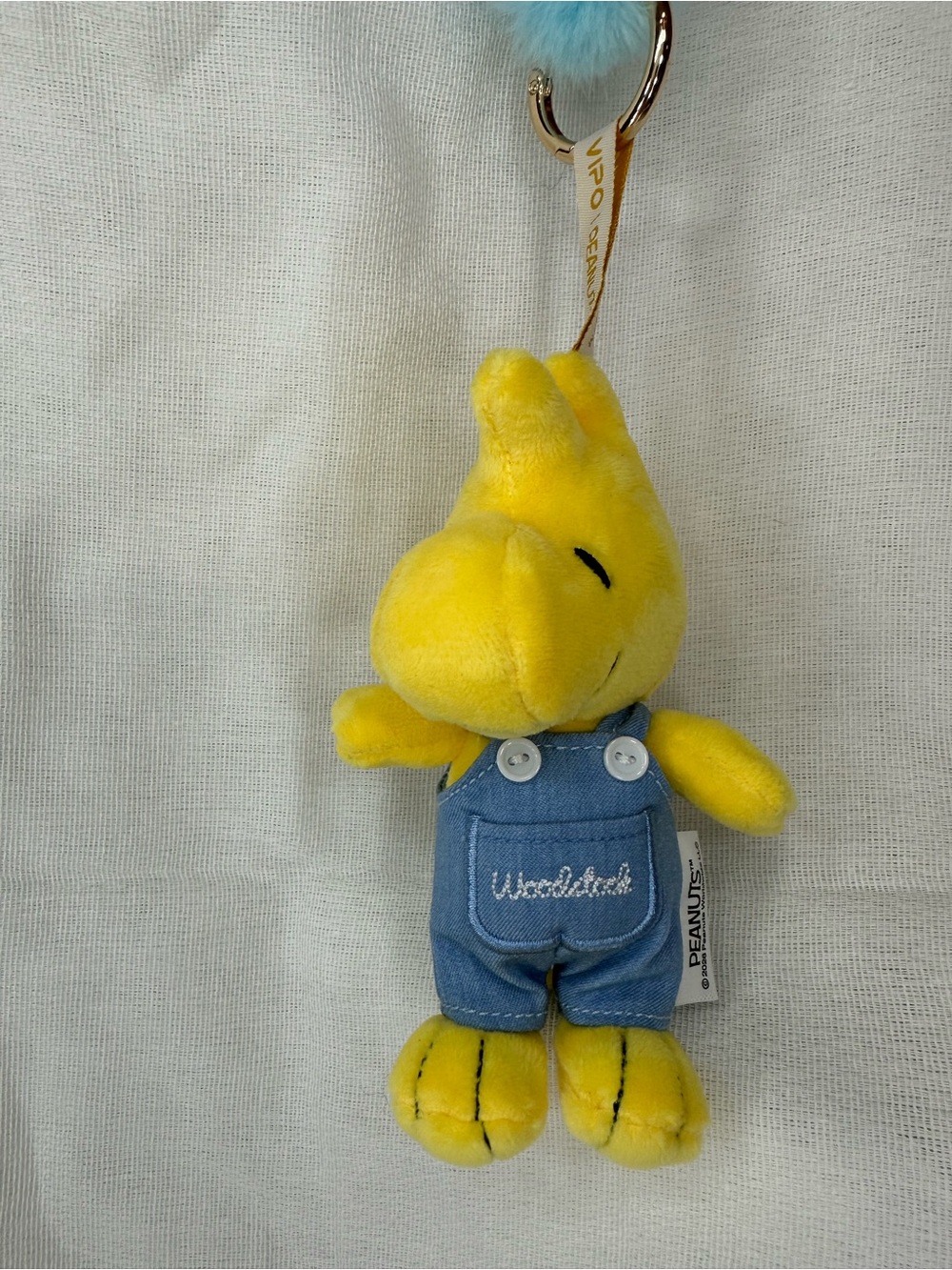 Woodstock Peanuts Plush Keychain in Yellow with Denim Overalls